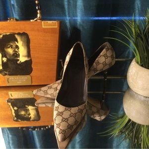 Authentic Gucci monogrammed pumps. Great condition. Dust bag included.